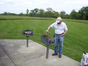 Scott Grilling up Hot Dogs