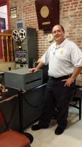 Bill inside of the Museum at the remote antique radio station that is hooked to a Radio Station in the area for special events.